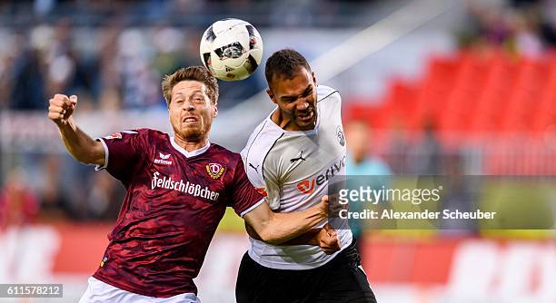 Lumpi of Dresden challenges Daniel Gordon of Sandhausen during the Second Bundesliga match between SV Sandhausen and SG Dynamo Dresden at...