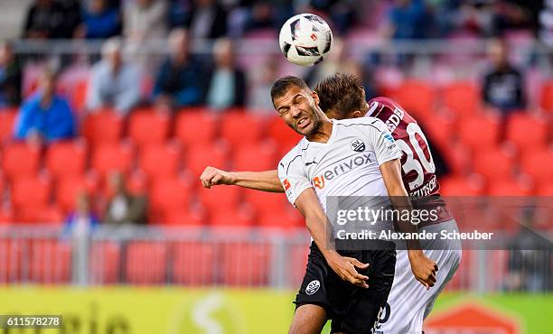 Daniel Gordon of Sandhausen challenges Stefan Kutschke of Dresden during the Second Bundesliga match between SV Sandhausen and SG Dynamo Dresden at...