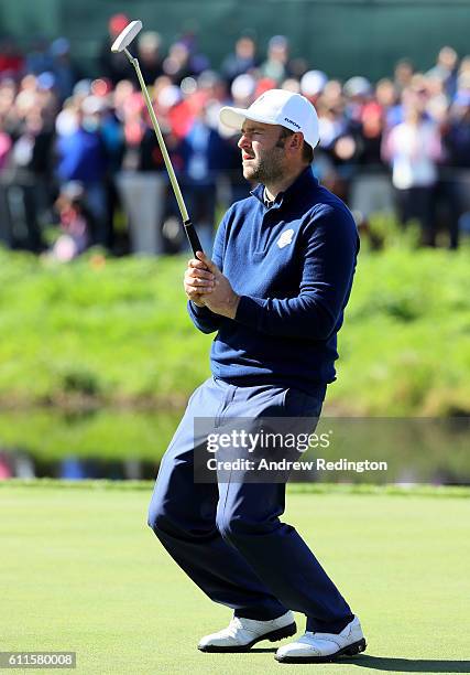 Andy Sullivan of Europe reacts to a missed putt on the 16th green during morning foursome matches of the 2016 Ryder Cup at Hazeltine National Golf...