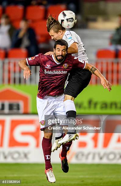 Jakub Koescki of Sandhausen challenges Nils Teixeira of Dresden during the Second Bundesliga match between SV Sandhausen and SG Dynamo Dresden at...