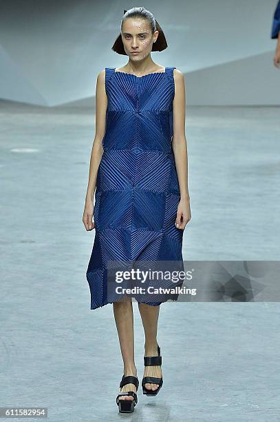 Model walks the runway at the Issey Miyake Spring Summer 2017 fashion show during Paris Fashion Week on September 30, 2016 in Paris, France.