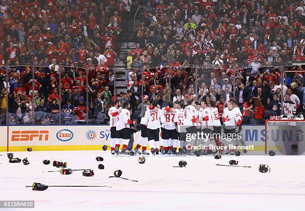Team Canada celebrate a 2-1 victory over Team Europe during Game Two of the World Cup of Hockey final series at the Air Canada Centre on September...