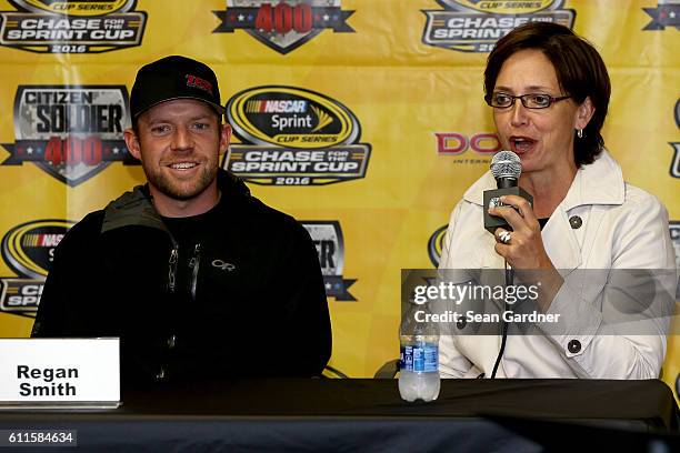 Regan Smith, driver of the Citizen Soldier Chevrolet and Wendy Anderson speak to the media during a press conference for the film Citizen Soldier at...