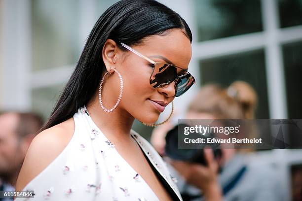 Rihanna is attending the Dior show, during Paris Fashion Week Spring Summer 2017, at the Rodin museum, on September 30, 2016 in Paris, France.