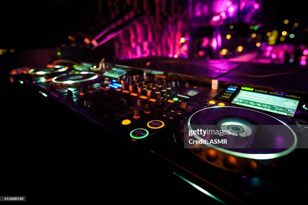 DJ console desk at nightclub