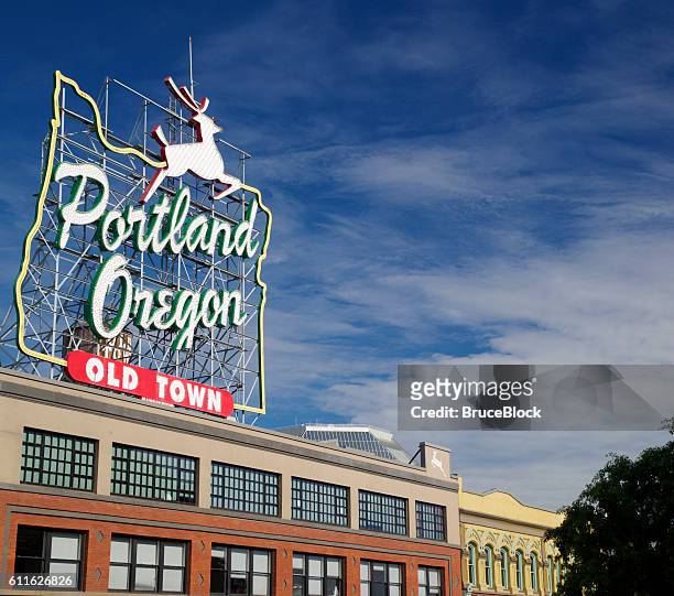 portland oregon landmark stag sign in old town - portland neon sign stock pictures, royalty-free photos & images