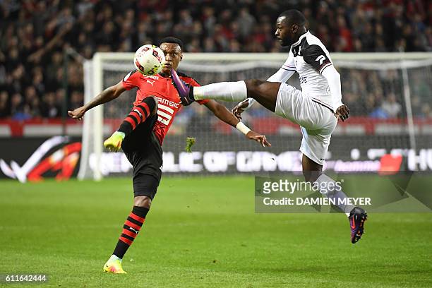 Rennes' Mozambican defender Edson Mexer vies with Guingamp's French midfielder Yannis Salibur during the French L1 football match Rennes against...