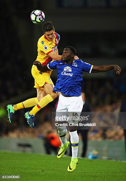 Martin Kelly of Crystal Palace outjumps Romelu Lukaku of Everton during the Premier League match between Everton and Crystal Palace at Goodison Park...
