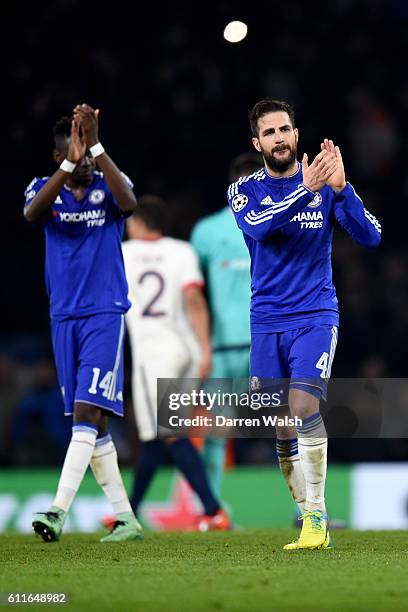 Chelsea's Bertrand Traore and Cesc Fabregas applaud the fans after the final whistle