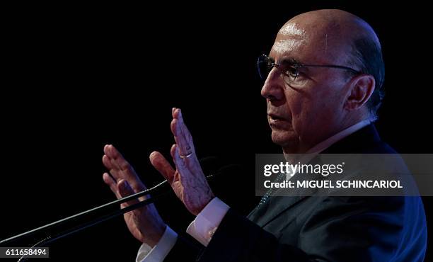 Brazilian Finance Minister Henrique Meirelles speaks during the 8th Exame Forum 2016, in Sao Paulo, Brazil on September 30, 2016. / AFP / Miguel...