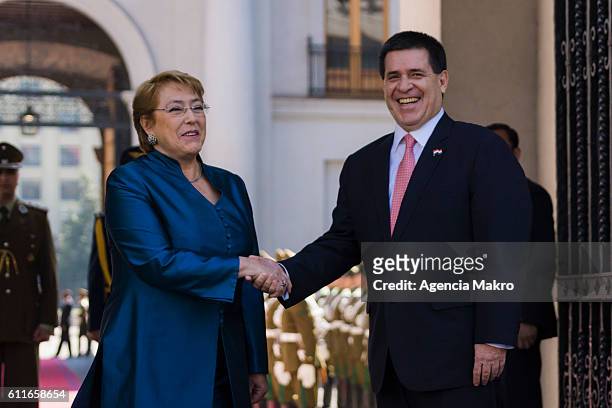 President of the Republic, Michelle Bachelet and the President of the Republic of Paraguay Horacio Cartes , greet each other at Palacio de La Moneda...