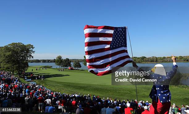 Fan wearing an eagle mask cheers during afternoon fourball matches of the 2016 Ryder Cup at Hazeltine National Golf Club on September 30, 2016 in...