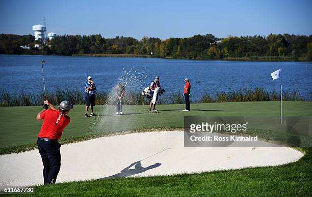 Holmes of the United States plays a shot on the tenth hole during afternoon fourball matches of the 2016 Ryder Cup at Hazeltine National Golf Club on...