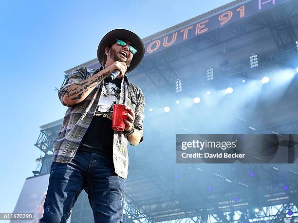 Recording artist Preston Brust of LoCash performs during the Route 91 Harvest country music festival at the Las Vegas Village on September 30, 2016...