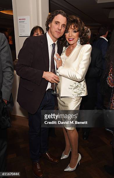 Sacha Newley and Dame Joan Collins attend an after party following Dame Joan Collins' one woman show "Joan Collins: Unscripted" at the Cafe Royal on...