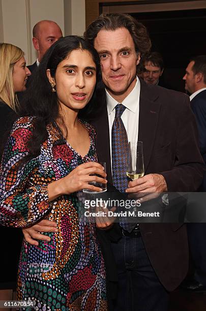 Sheela Raman and Sacha Newley attend an after party following Dame Joan Collins' one woman show "Joan Collins: Unscripted" at the Cafe Royal on...