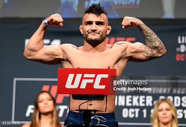 John Lineker of Brazil steps onto the scale during the UFC Fight Night weigh-in at the Oregon Convention Center on September 30, 2016 in Portland,...