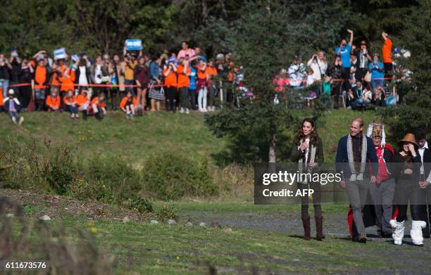 The Duke and Duchess of Cambridge, view totem poles at the Haida Heritage Centre and Museum in Haida Gwaii, British Columbia on September 30, 2016.