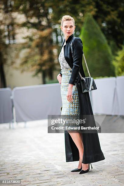 Model Karlie Kloss is seen outside of the Christian Dior show during Paris Fashion Week Spring Summer 2017 at the Rodin museum on September 30, 2016...