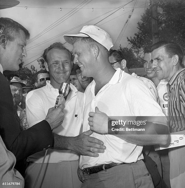 Arnold Palmer pats and Jack Nicklaus on the tummy after both golfers tied with a 283 and necessitated a play off for the U.S. Open at the Oakmont...