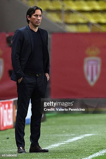 Bayer 04 Leverkusen head coach Roger Schmidt watches the action during the UEFA Champions League Group E match between AS Monaco FC and Bayer 04...