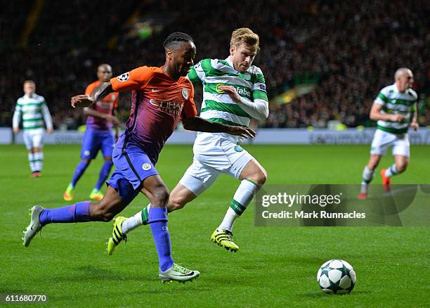 Raheem Sterling of Manchester City takes on Stuart Armstrong of Celtic during the UEFA Champions League match between Celtic FC and Manchester City...