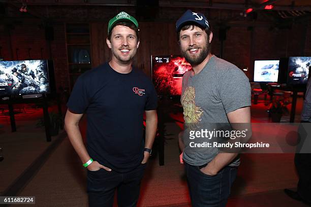 Actor Jon Heder, left, and brother Dan attend the Xbox & Gears Of War 4 Los Angeles launch event at The Microsoft Lounge on September 30, 2016 in...