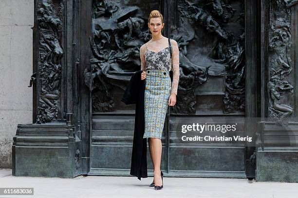 Model Karlie Kloss outside Dior on September 30, 2016 in Paris, France.