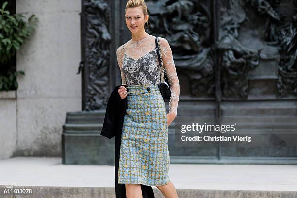 Model Karlie Kloss outside Dior on September 30, 2016 in Paris, France.