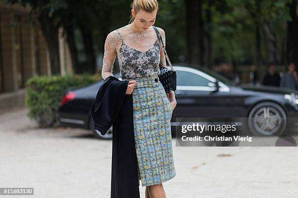 Model Karlie Kloss outside Dior on September 30, 2016 in Paris, France.