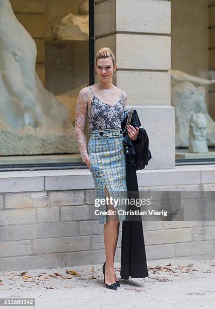 Model Karlie Kloss outside Dior on September 30, 2016 in Paris, France.