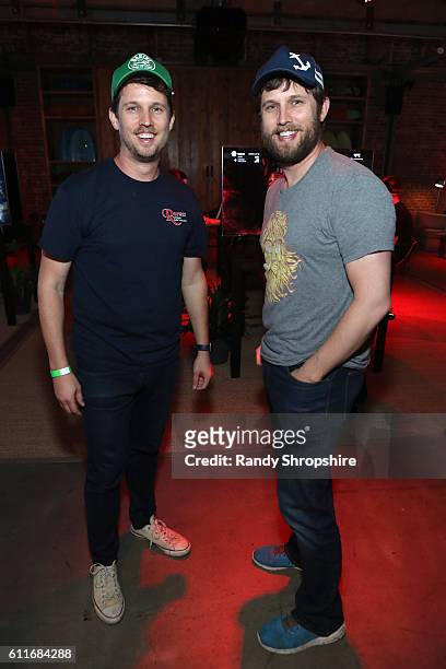 Actor Jon Heder, left, and brother Dan attend the Xbox & Gears Of War 4 Los Angeles launch event at The Microsoft Lounge on September 30, 2016 in...
