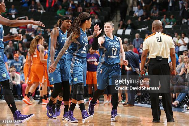 The Minnesota Lynx celebrate during the game against the Phoenix Mercury in Game Two of the Semifinals during the 2016 WNBA Playoffs on September 30,...