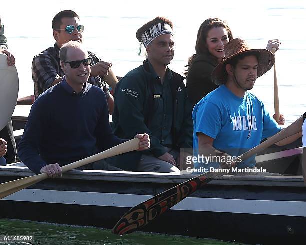 Prince William, Duke of Cambridge and Catherine, Duchess of Cambridge help to row a 25ft Haida war canoe on their visit to the island of Haida Gwaii...