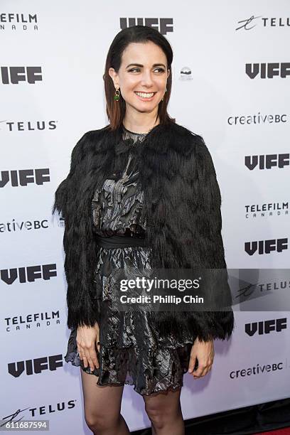 Actress Mia Kirshner arrives on the red carpet for her film "Milton's Secret" at the Centre for the Performing Arts during the 35th Vancouver...