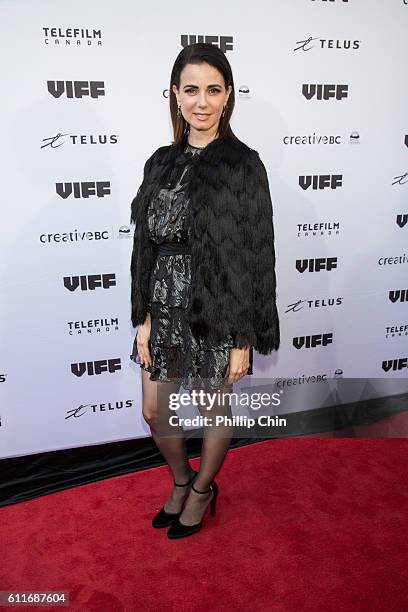 Actress Mia Kirshner arrives on the red carpet for her film "Milton's Secret" at the Centre for the Performing Arts during the 35th Vancouver...