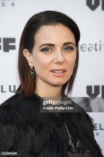 Actress Mia Kirshner arrives on the red carpet for her film "Milton's Secret" at the Centre for the Performing Arts during the 35th Vancouver...