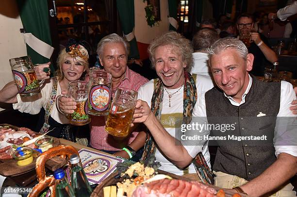 Thea Gottschalk, Klaus Wowereit, Thomas Gottschalk and Siegfried Able attend the 'Thomas and friends Wiesn' at the Marstall Festzelt during the...