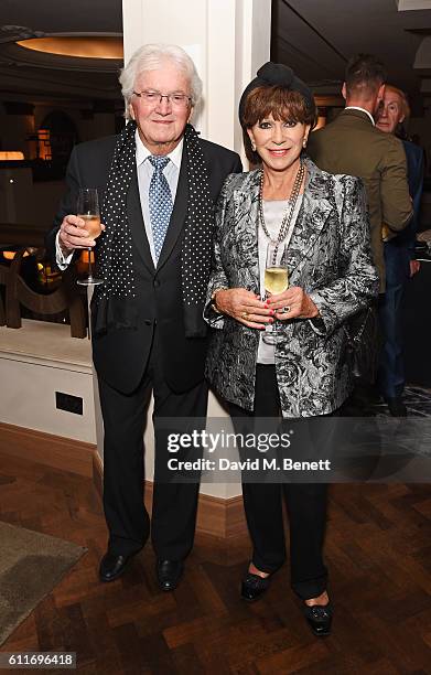 Leslie Bricusse and Yvonne Romain attend an after party following Dame Joan Collins' one woman show "Joan Collins: Unscripted" at the Cafe Royal on...