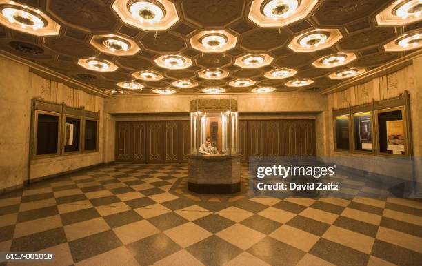 lobby of movie theater - taquilla lugar de comercio fotografías e imágenes de stock