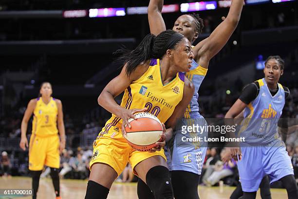Nneka Ogwumike of the Los Angeles Sparks handles the ball against Clarissa dos Santos of the Chicago Sky in Game Two of the Semifinals during the...
