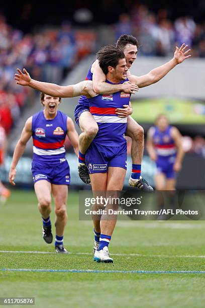 Tom Boyd of the Bulldogs celebrates a goal during the 2016 AFL Grand Final match between the Sydney Swans and the Western Bulldogs at Melbourne...