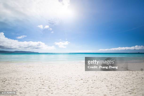 the sunshine beach in boracay - soleggiato foto e immagini stock