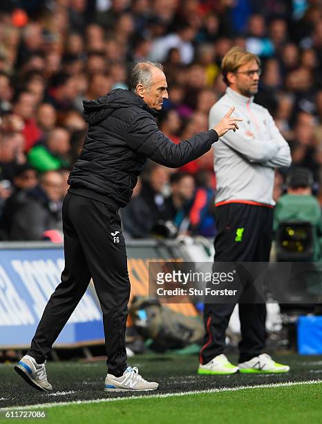 Francesco Guidolin, Manager of Swansea City gives his team instructions during the Premier League match between Swansea City and Liverpool at Liberty...