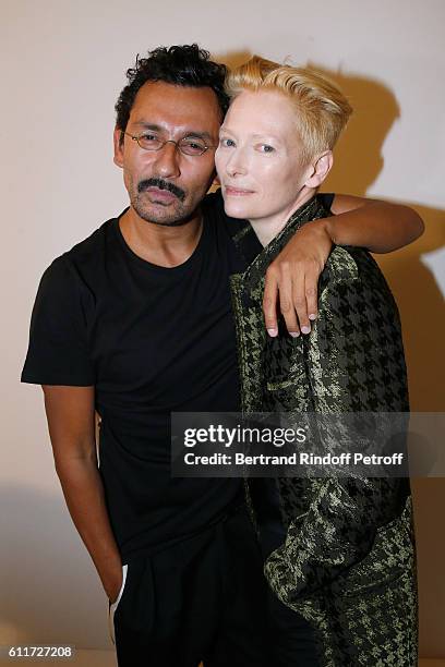 Stylist Haider Ackermann and actress Tilda Swinton pose Backstage after the Haider Ackermann show as part of the Paris Fashion Week Womenswear...