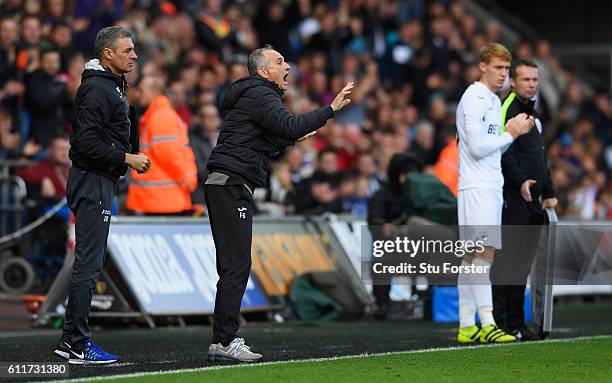 Francesco Guidolin, Manager of Swansea City gives his team instructions during the Premier League match between Swansea City and Liverpool at Liberty...