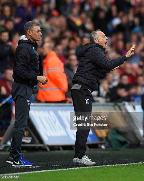 Francesco Guidolin, Manager of Swansea City gives his team instructions during the Premier League match between Swansea City and Liverpool at Liberty...