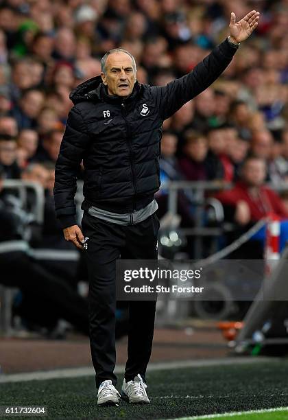 Francesco Guidolin, Manager of Swansea City gives his team instructions during the Premier League match between Swansea City and Liverpool at Liberty...