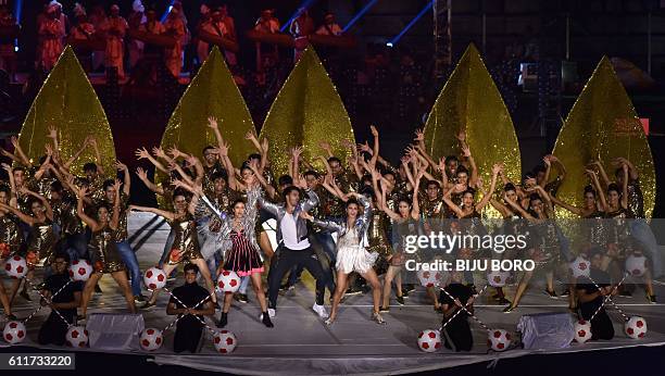 Bollywood actors Alia Bhatt , Varun Dhawan , Jacqueline Fernandez are joined by others as they perform during the the opening ceremony of the Indian...