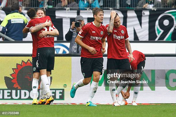 Stefan Strandberg, Kenan Karaman, Valdemar Anton and Marvin Bakalorz of Hannover celebrate the goal that put Hannover 1- 0 up during the Second...